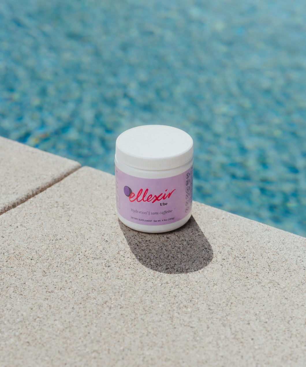 Ellexir Ube Hydration jar poolside